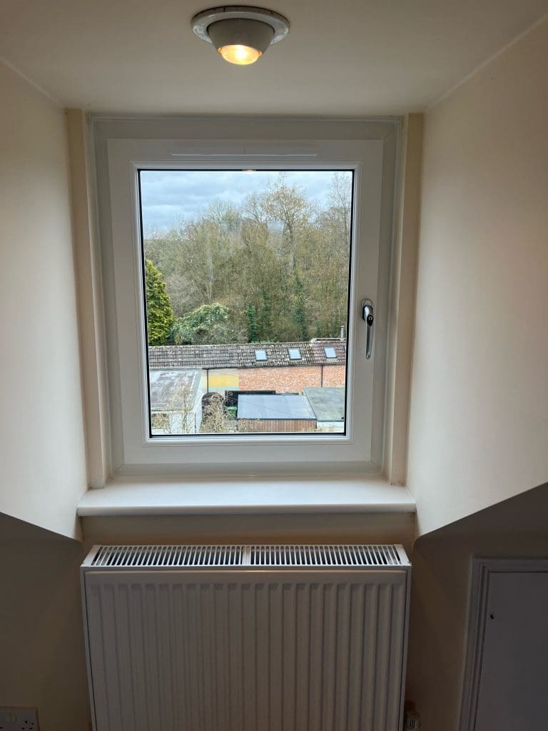 Clear white UPVC bedroom window after misted double glazing repair