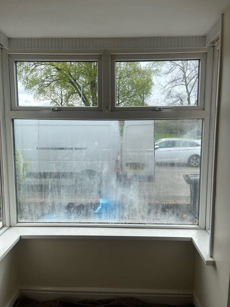 Before: The failed double glazing unit is misted and lets in very little light and gives an obsctucted view of the outside.